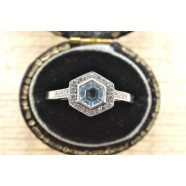 DIAMOND AND BLUE TOPAZ RING